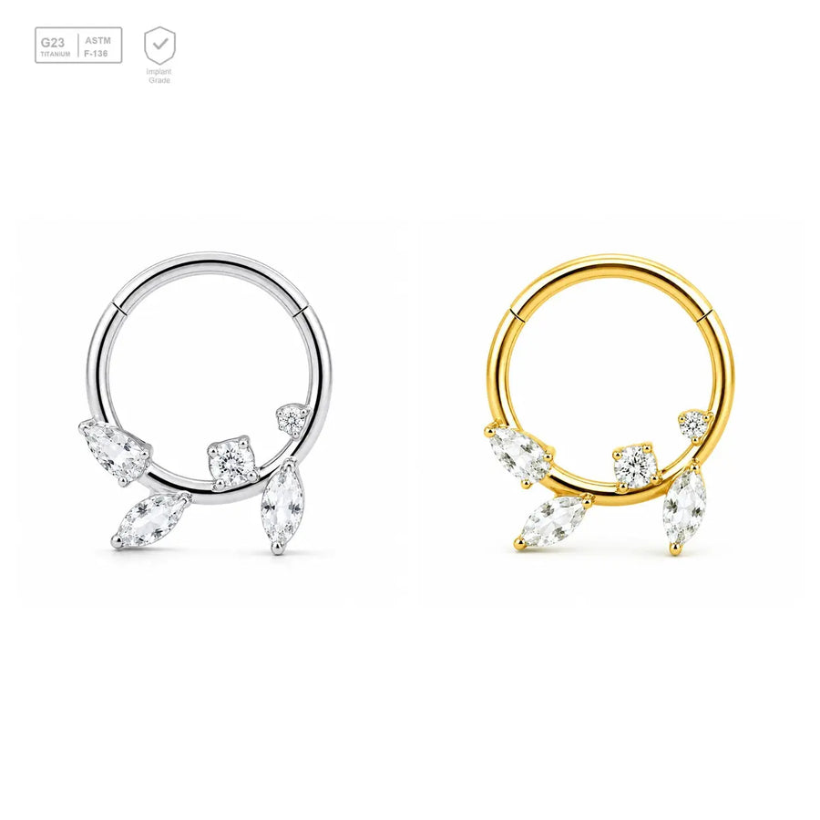 Asymmetric Crystal Orbit titanium segment ring in natural titanium and gold-plated finishes
