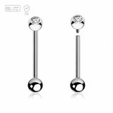 Polished titanium tongue barbell with a 5mm bezel-set crystal ball and plain ball