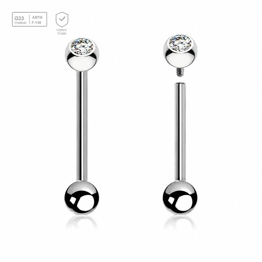 Polished titanium tongue barbell with a 5mm bezel-set crystal ball and plain ball