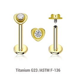 Pack of 5 gold PVD plated titanium internally threaded labrets, Thickness 1.2mm, with a top in a flat heart shape with a single bezel set central crystal