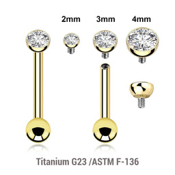 Pack of 5 Gold PVD plated titanium internally threaded tragus barbells,  Thickness 1.2mm, with a half ball with a bezel set crystal and a lower 3mm plain ball