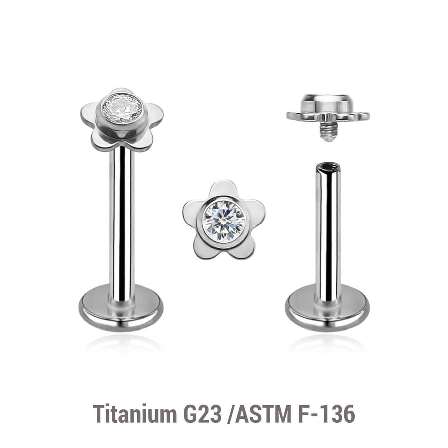 Pack of 5 high polished titanium internally threaded labrets, Thickness 1.2mm, with a top in a flat flower shape with a single bezel set central crystal